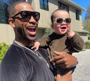 Tristan Thompson poses with Kourtney & Khloe Kardashian Tristan Thompson poses with Kourtney & Khloe Kardashian