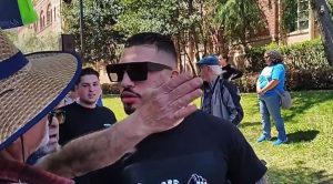 Pro Boxer Kaminsky seen spitting on a man during protest Pro Boxer Kaminsky seen spitting on a man during protest