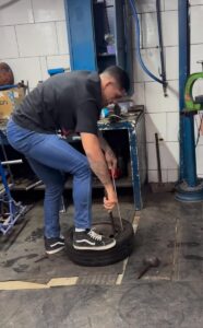 Alex Pereira visits the tyre repair shop he used to work in Brazil  