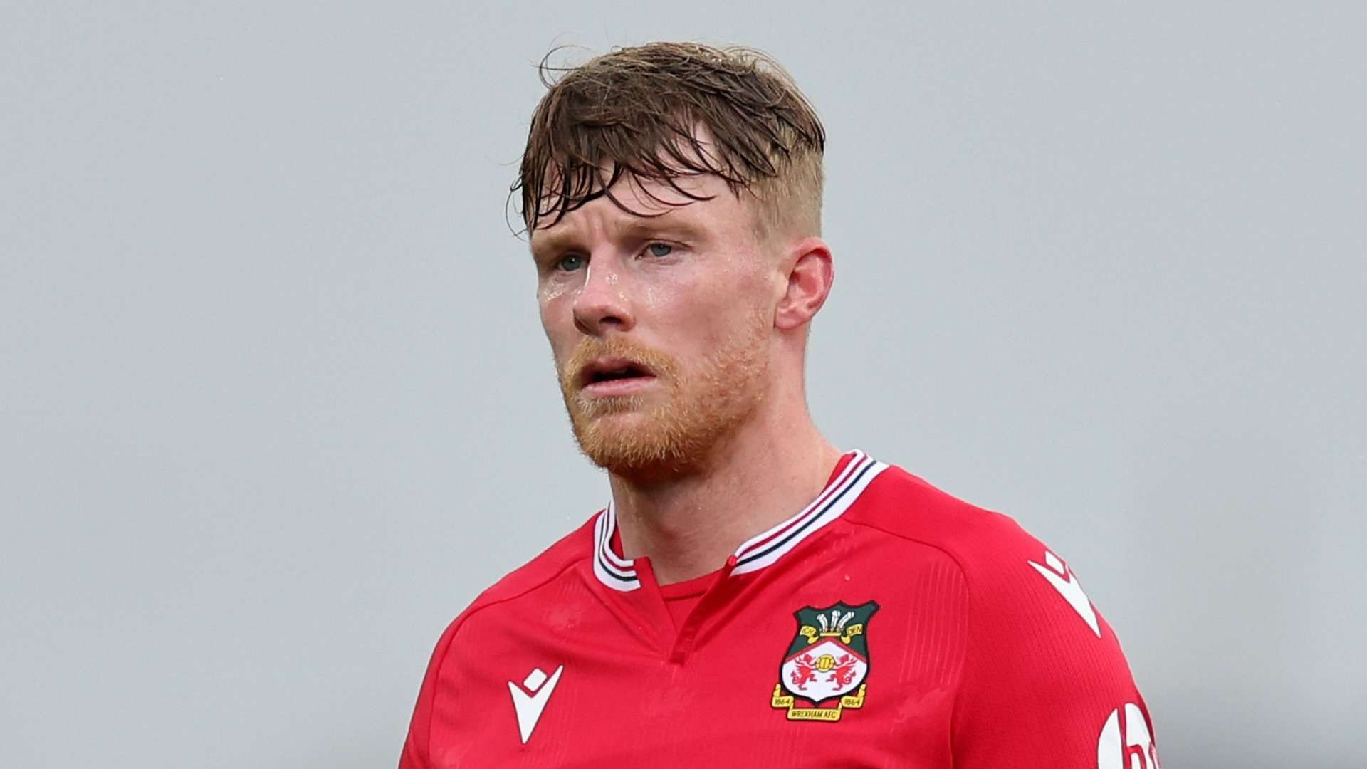 Wrexham tie key midfielder to new contract  