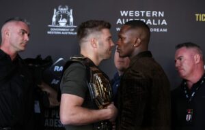 Israel Adesanya reacts to a Yusuf Dikec meme that compares him and Pereira  