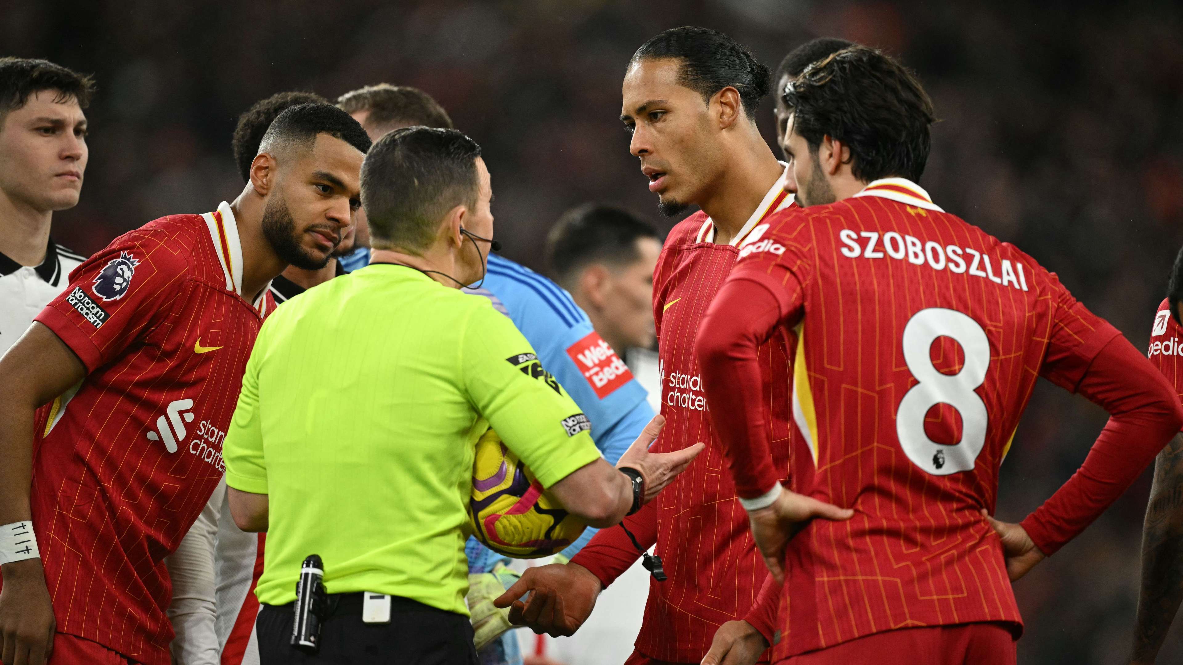 Van Dijk takes aim at 'nervous' referee after Robertson red  