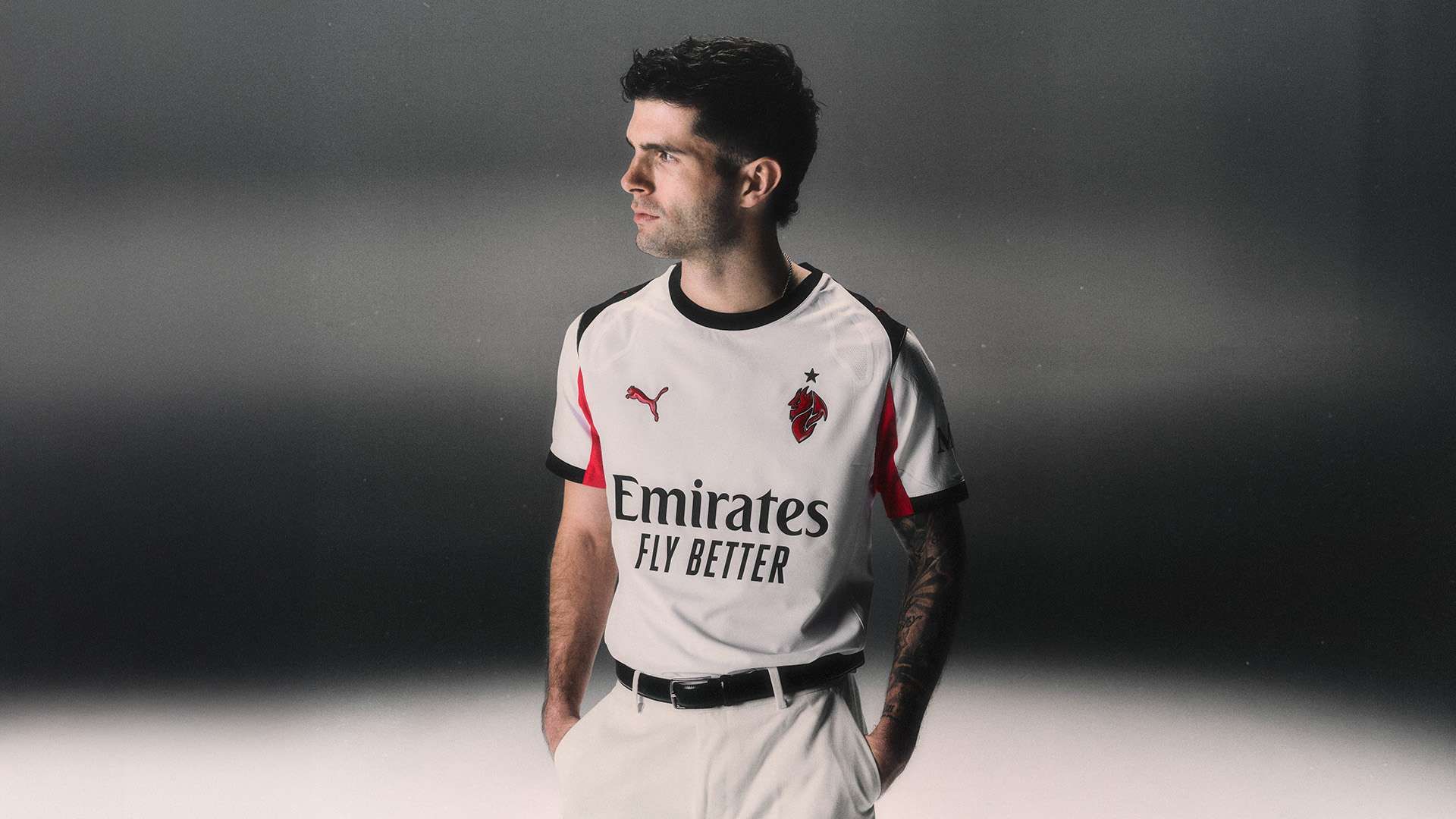 USMNT's Pulisic helps promote 'devilish' new AC Milan away kit  