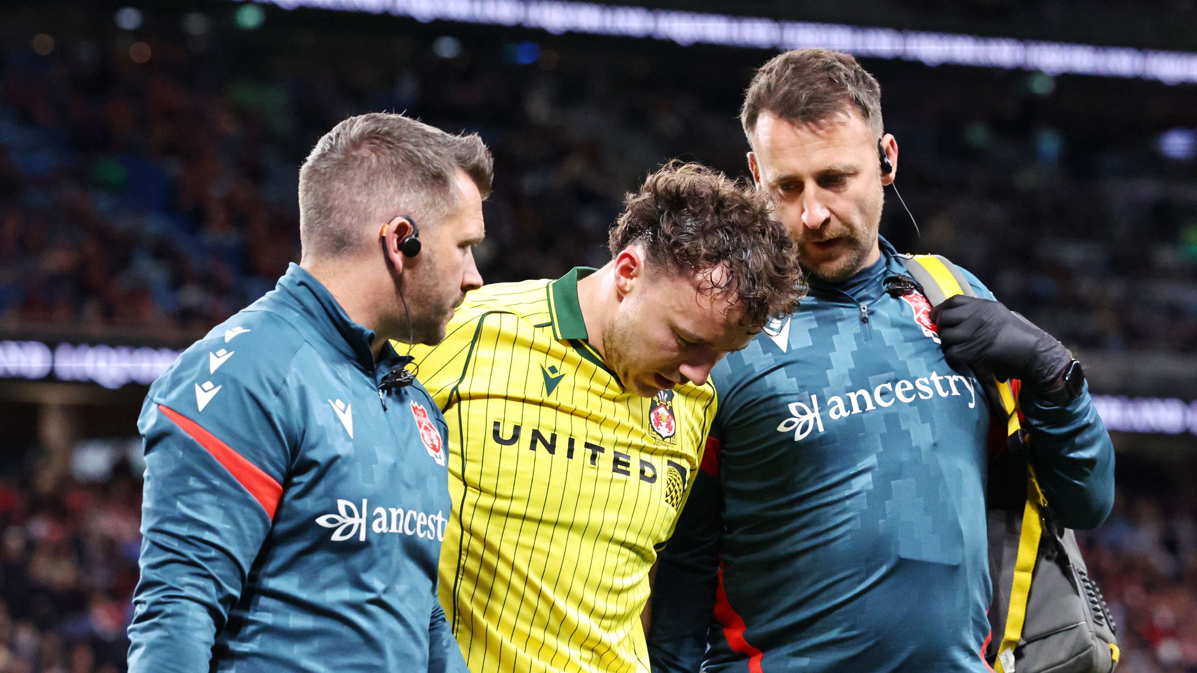 Wrexham talisman Rathbone rushed to hospital  