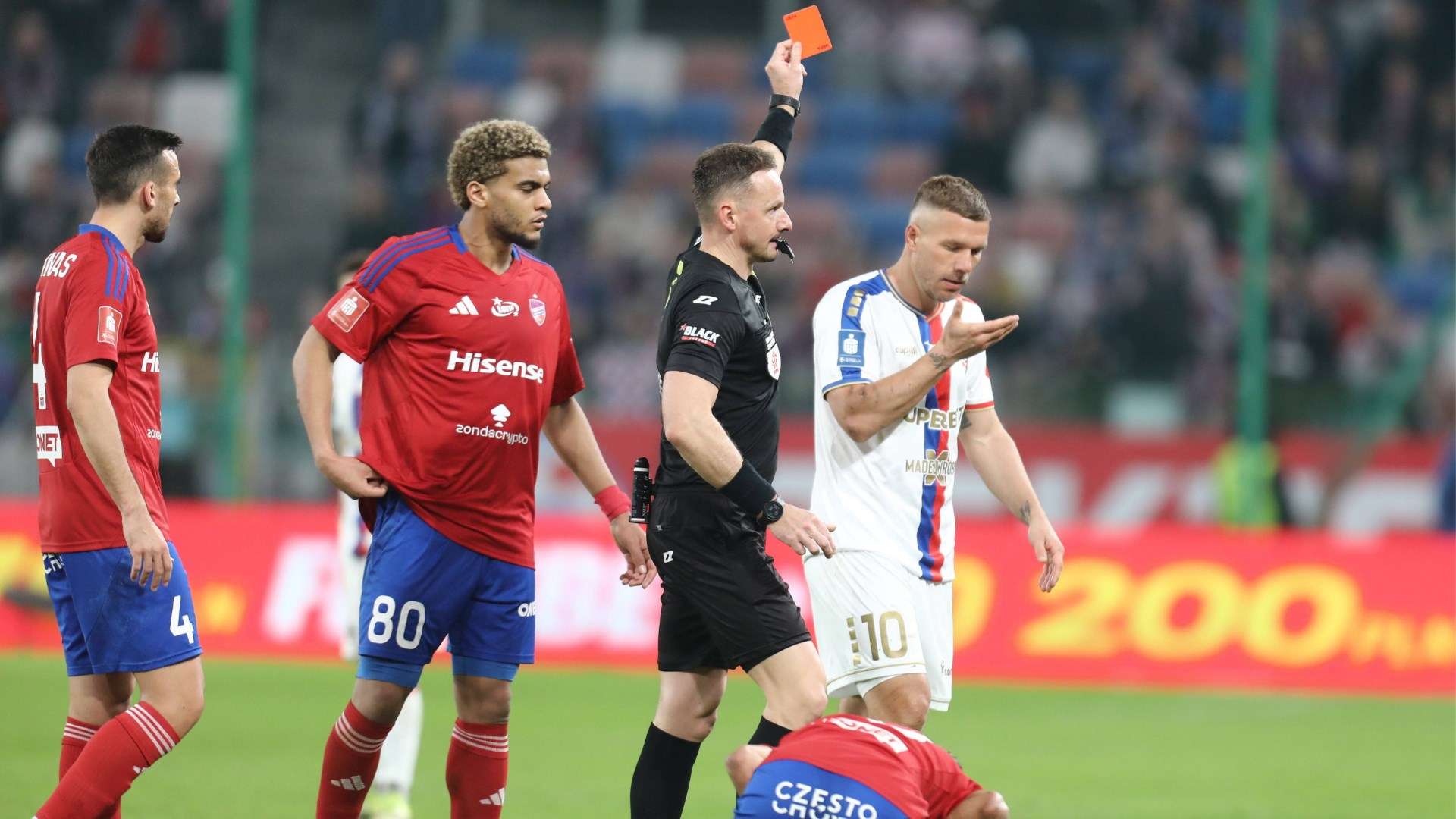 A scuffle after just two minutes! Podolski loses his temper  