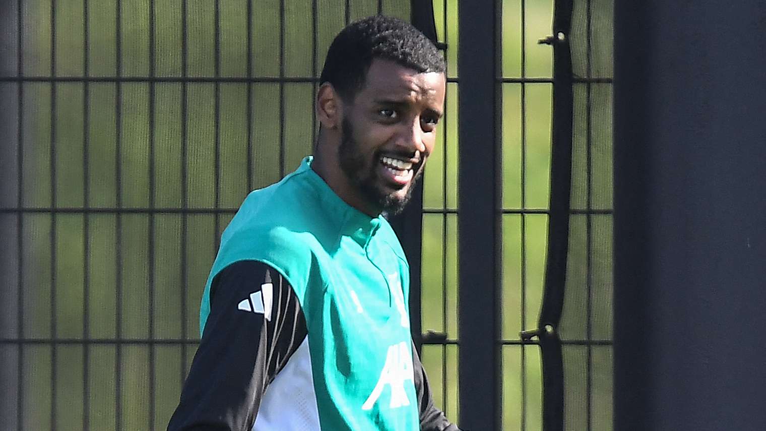 Isak returns to Liverpool training with striking new look  