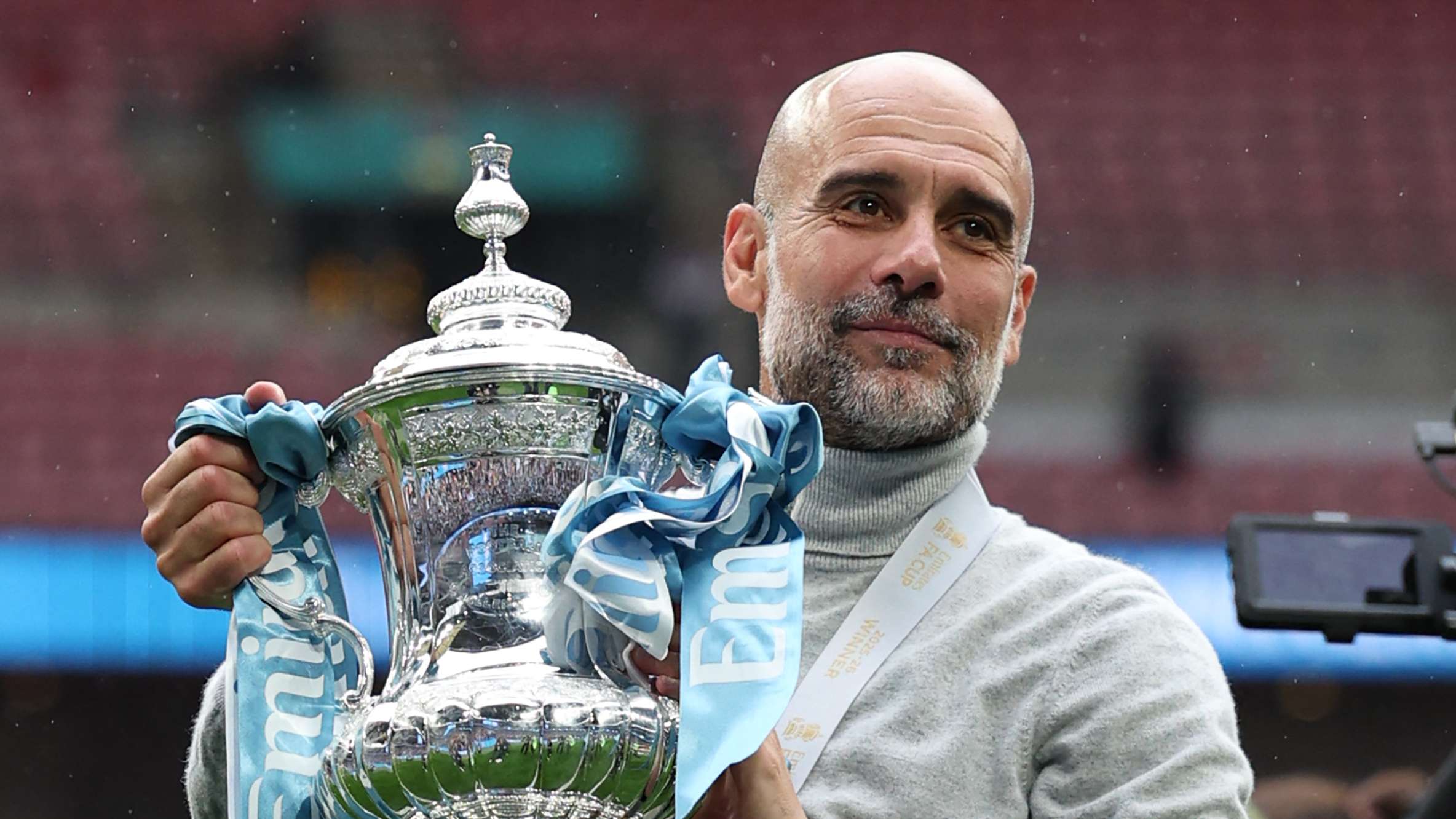 Guardiola tight-lipped on Man City future after FA Cup win  