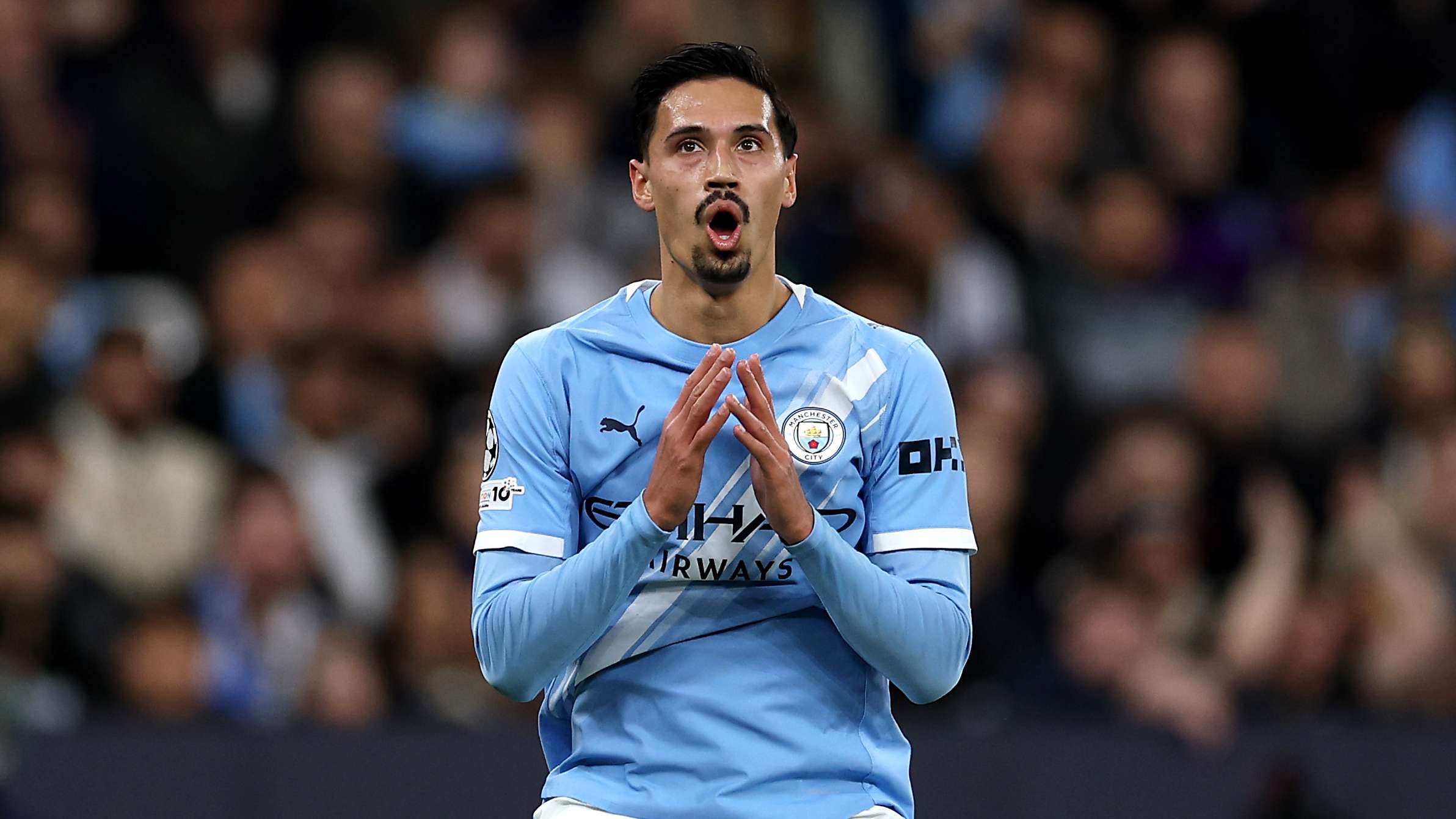 How much AC Milan earn from Reihnders' departure to Manchester City  